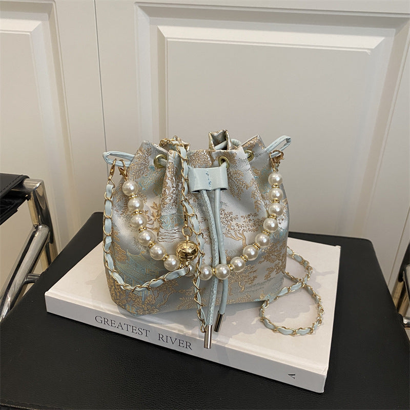 Textured and Embroidered Shoulder Bag