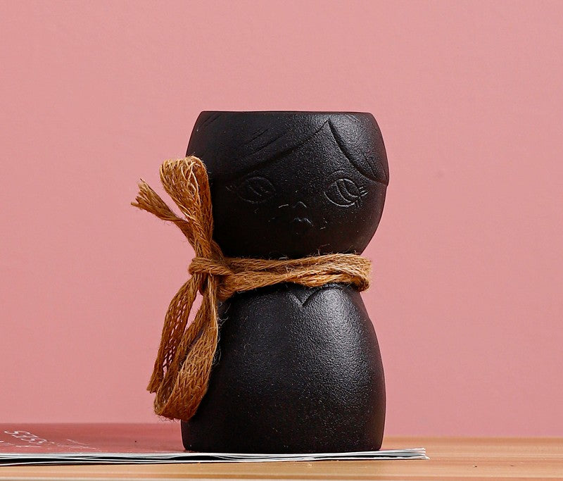 Porcelain Face Vase On Porch Table