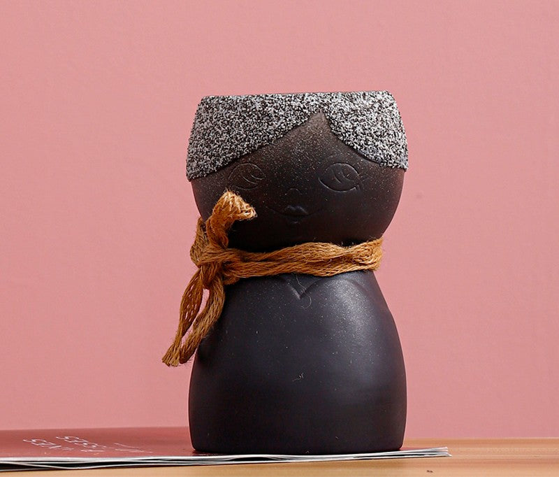 Porcelain Face Vase On Porch Table
