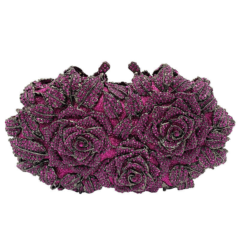 Purple rose-shaped jewelry piece on a white background