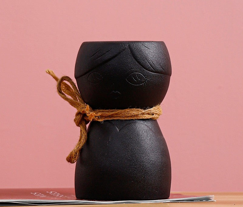 Porcelain Face Vase On Porch Table